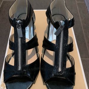 Black Michael Kors zip sandals